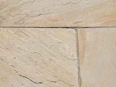 Nærbillede af beige sandsten Yellow Mint