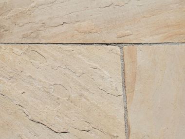 Nærbillede af beige sandsten Yellow Mint