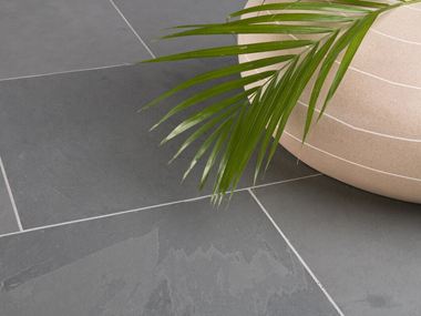 Grey Slate fliser med dekoration og palmegren