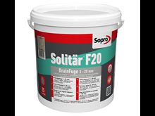 Spand med brolæggerfuge til lægning af fliser